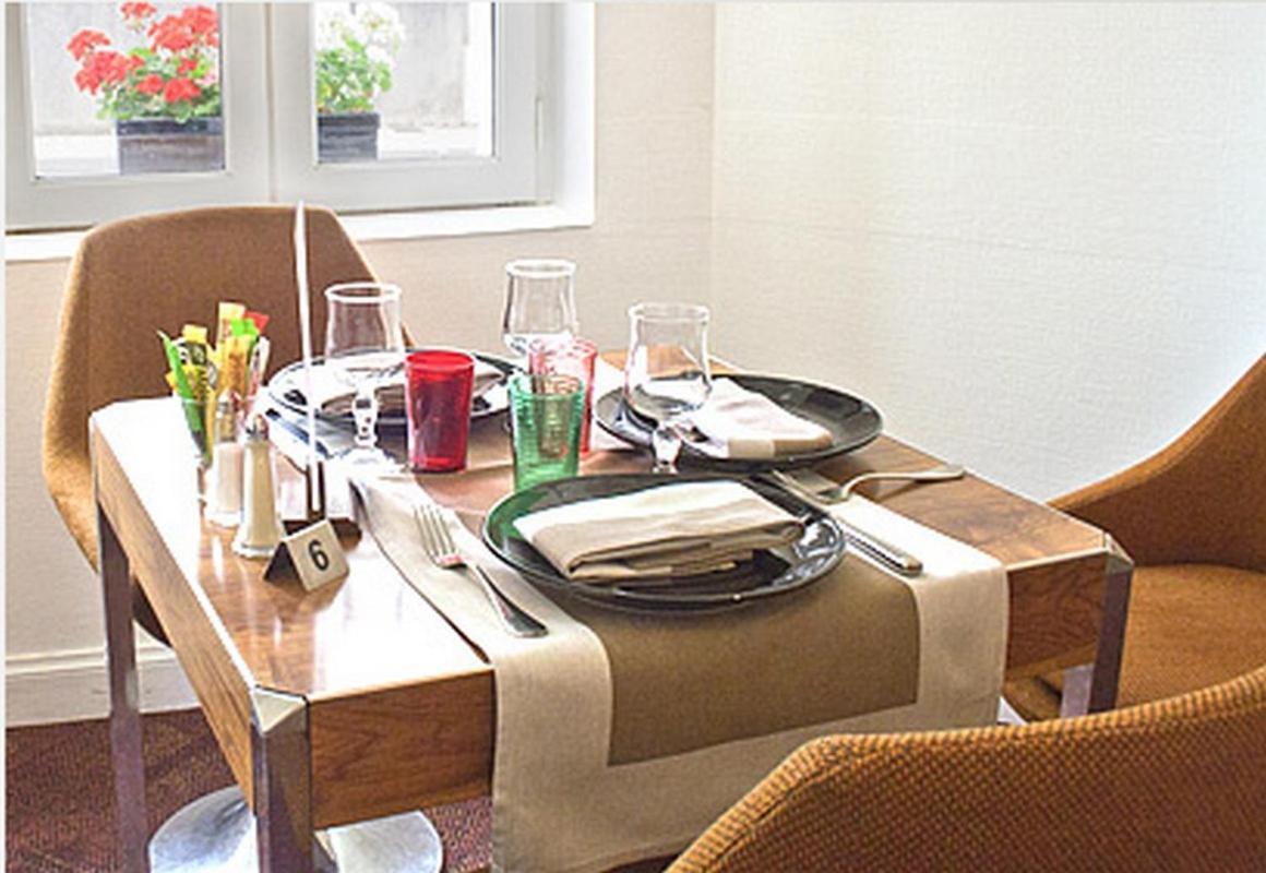 Logis Hotel De France Restaurant Le Lucullus มองต์มอริญอง ภายนอก รูปภาพ